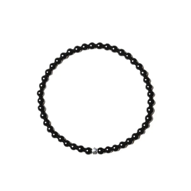 Geometric black agate bracelet with 4mm obsidian and blue San beads and cut surface details