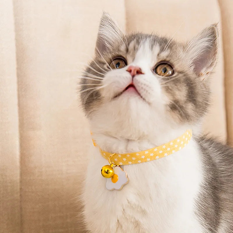 Adjustable cat collar with bell pendant and bow tie decoration for small pets in green, pink, yellow colours