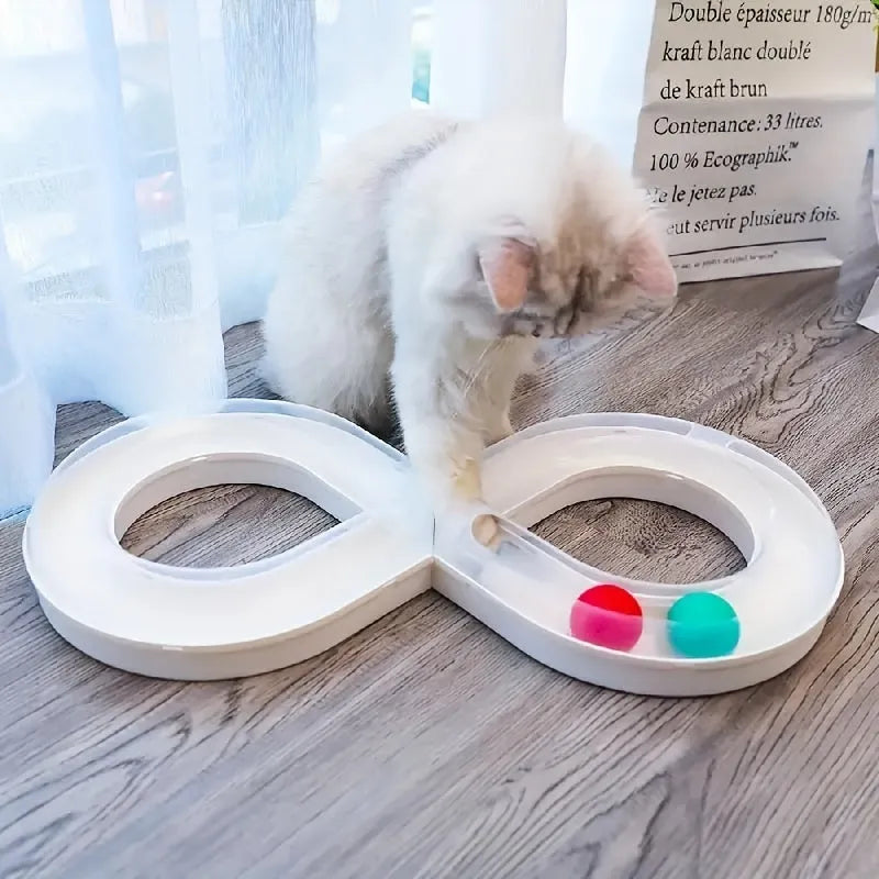 Blue and white plastic cat toy turntable track with a ball and a separate teasing stick.