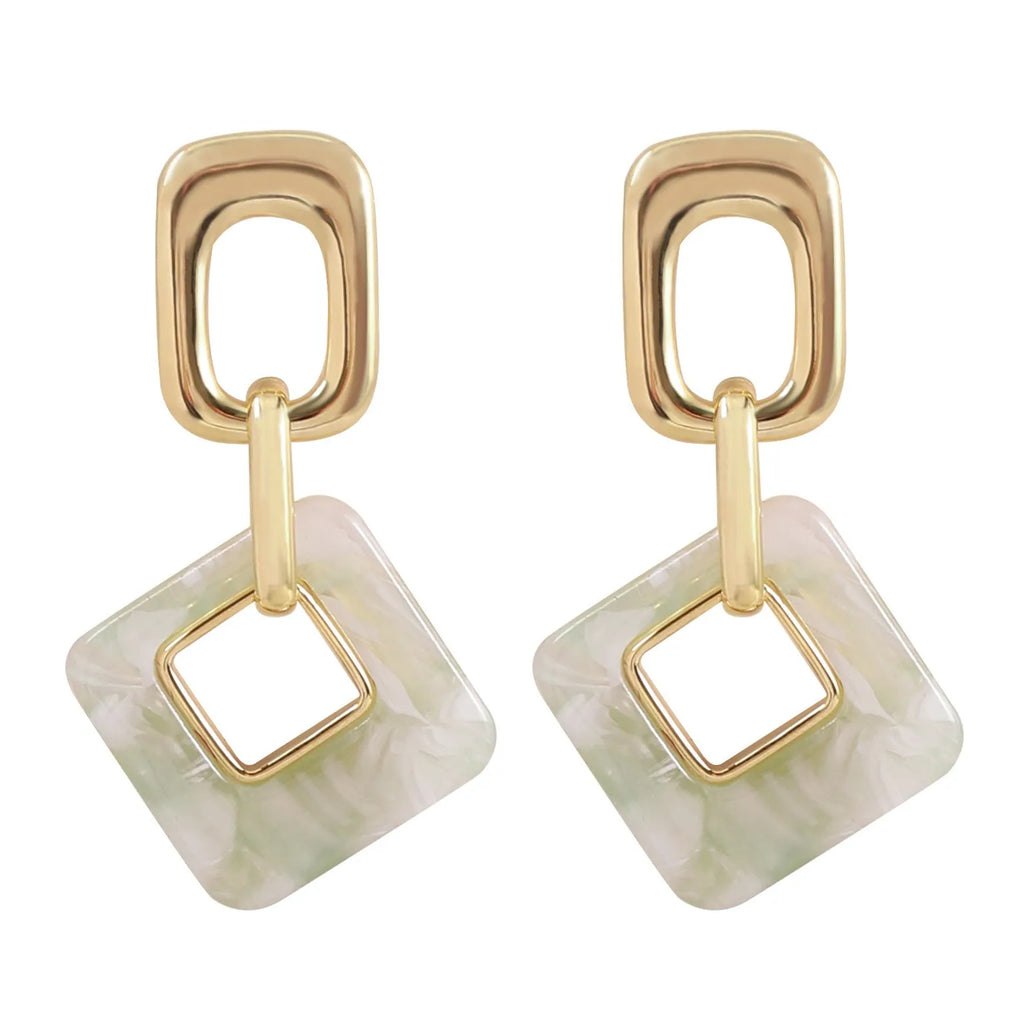 Hollow geometric square earrings in copper with electroplated finish and chamfered corners