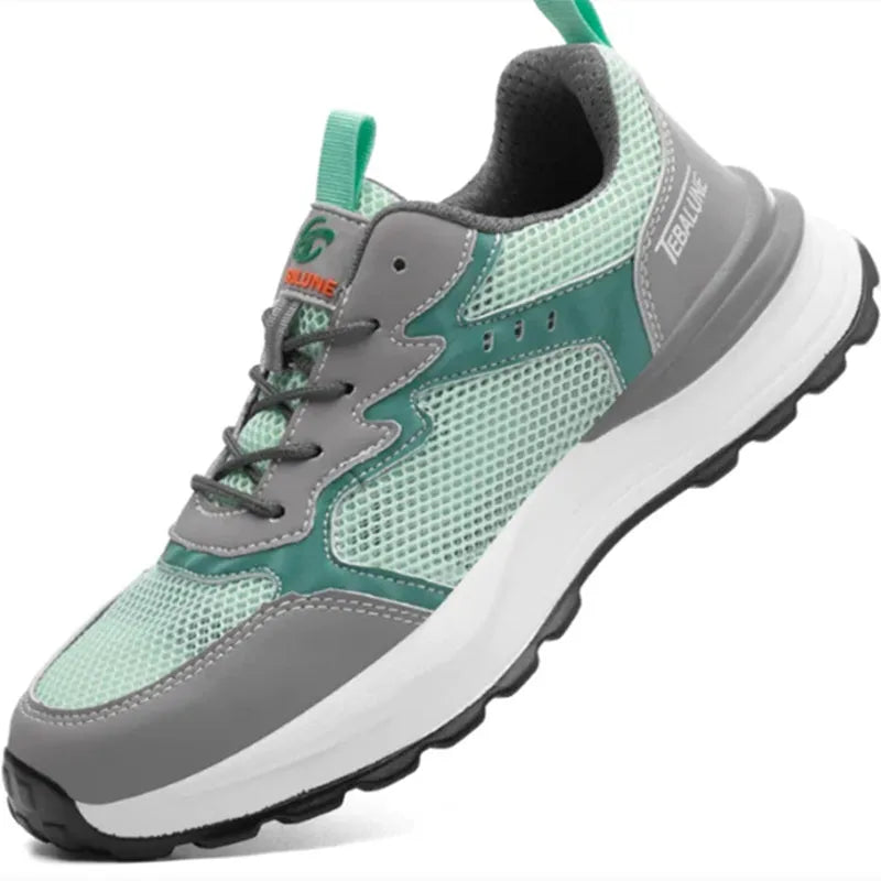 Green low-top anti-smash work shoes with plastic steel toe, mesh upper, and TPU sole
