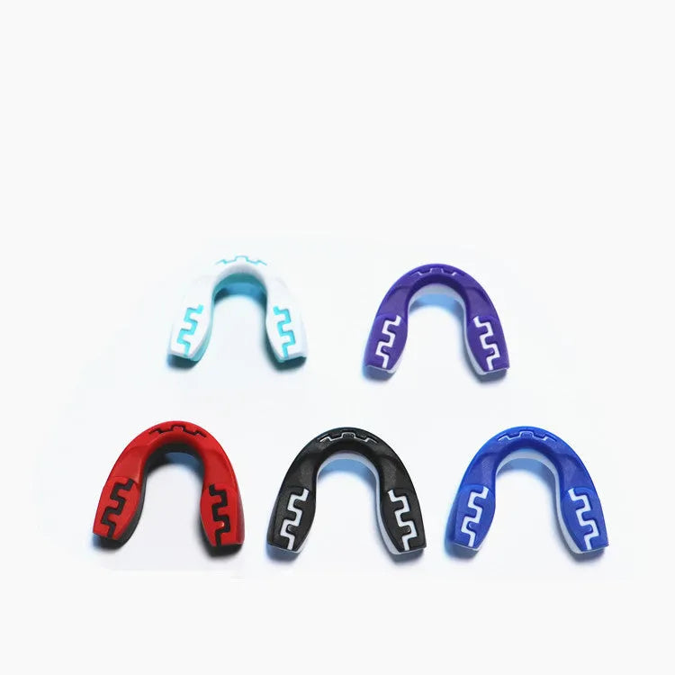 Adult boxing mouthguard with tooth socket design in multiple colour variations