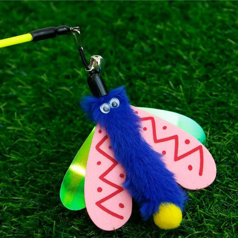 Cat wand toy with bell dragonfly attachment in green, yellow, and pink on white background