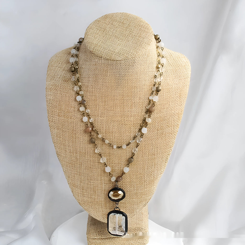 Two-layer tribal style necklace with glass and stone pendants on adjustable chain