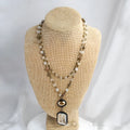 Two-layer tribal style necklace with glass and stone pendants on adjustable chain