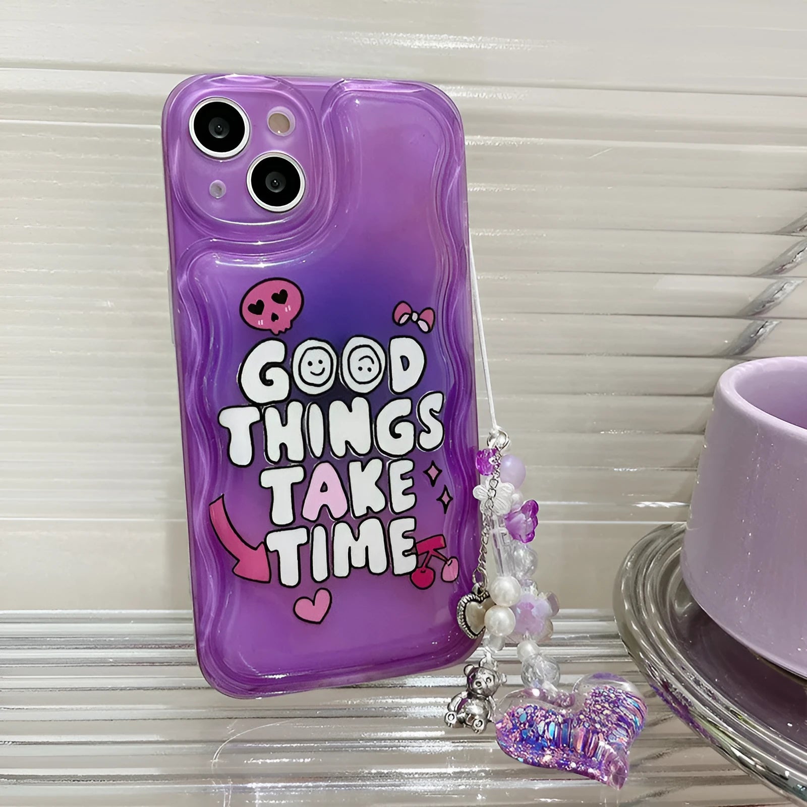 Purple graffiti English love chain phone case for iPhone 14 with love pendant on white background
