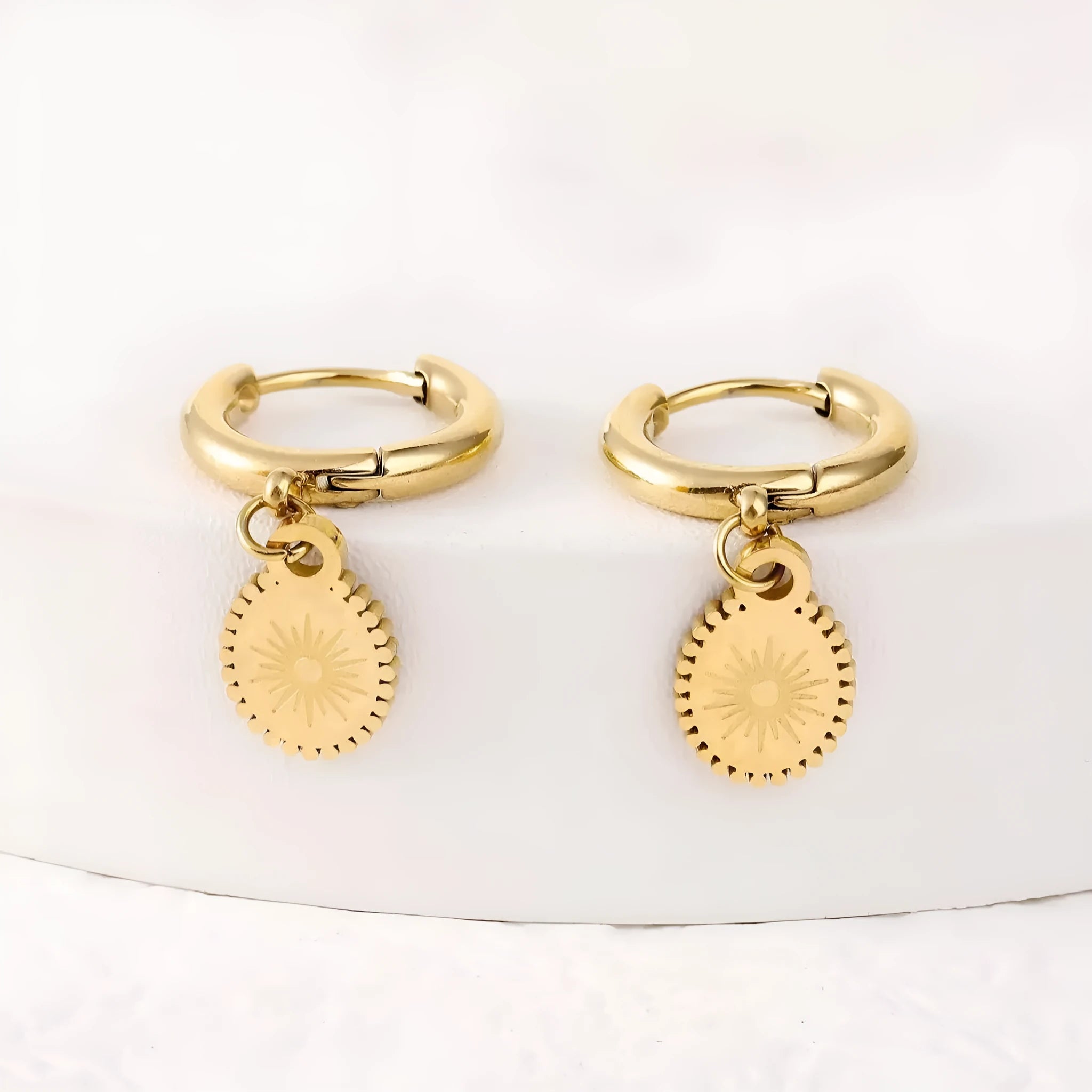 A pair of geometric stainless steel earrings with an ellipse detail, colour XY-EH005.