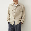 Men's long sleeve shirt with lapel collar in Light Sand Rice colour, simple profile.