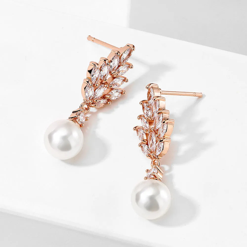 Geometric flower earrings with micro zircon detailing in gold, platinum and rose gold plating