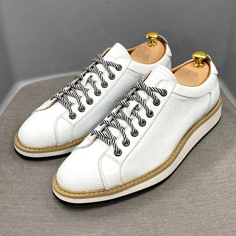 Men's low-tube casual shoes with an embossed pattern on the upper and front tie lacing.