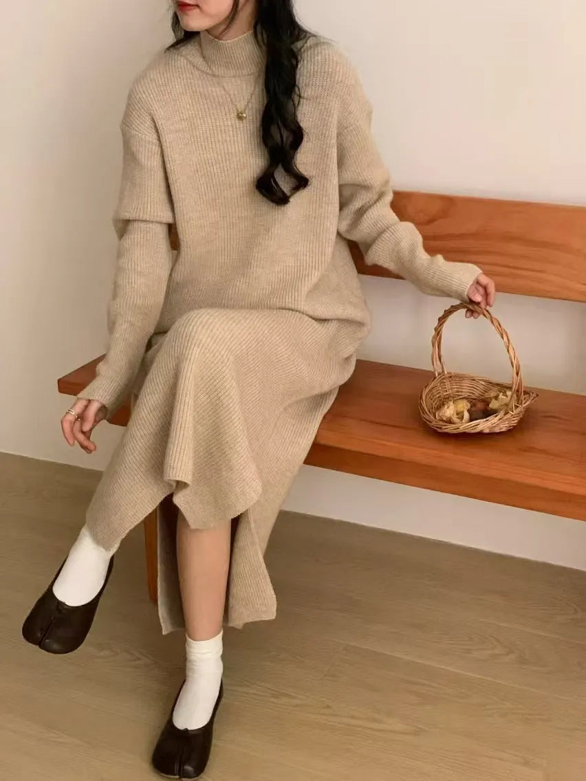 Women's beige half-turtleneck knitted midi dress with long sleeves on a hanger.