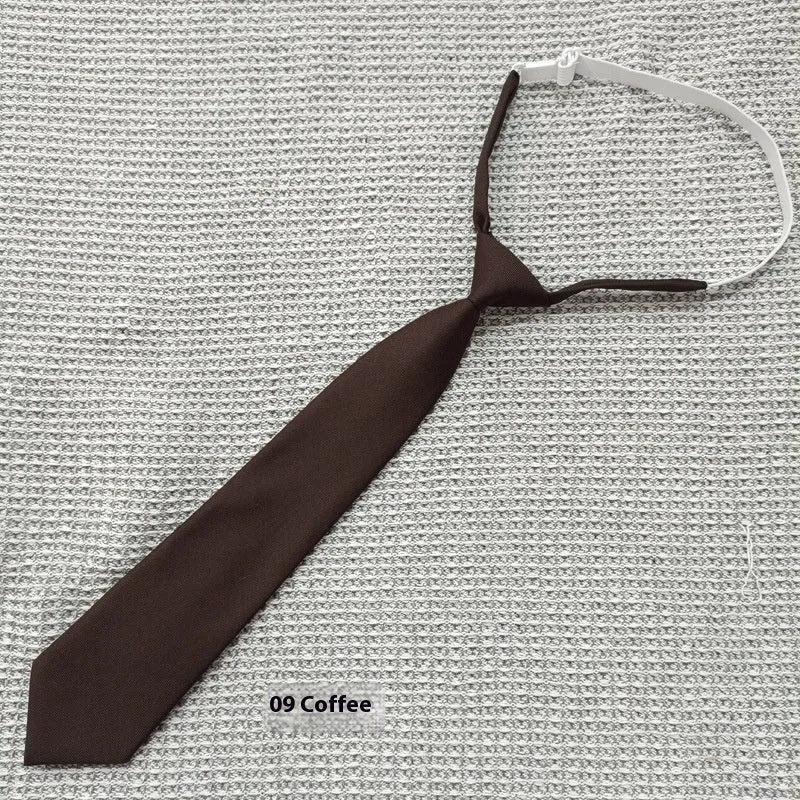 Arrow-shaped cotton bow tie in solid navy blue colour on white background