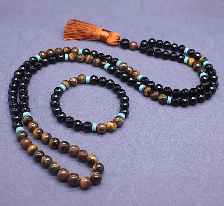 Geometric agate jewellery set with black bracelet and tiger-eye necklace