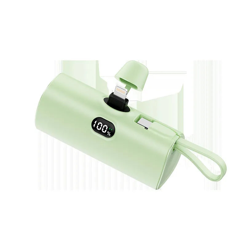 Capsule digital display wireless power bank in five colours showing compact 79mm size