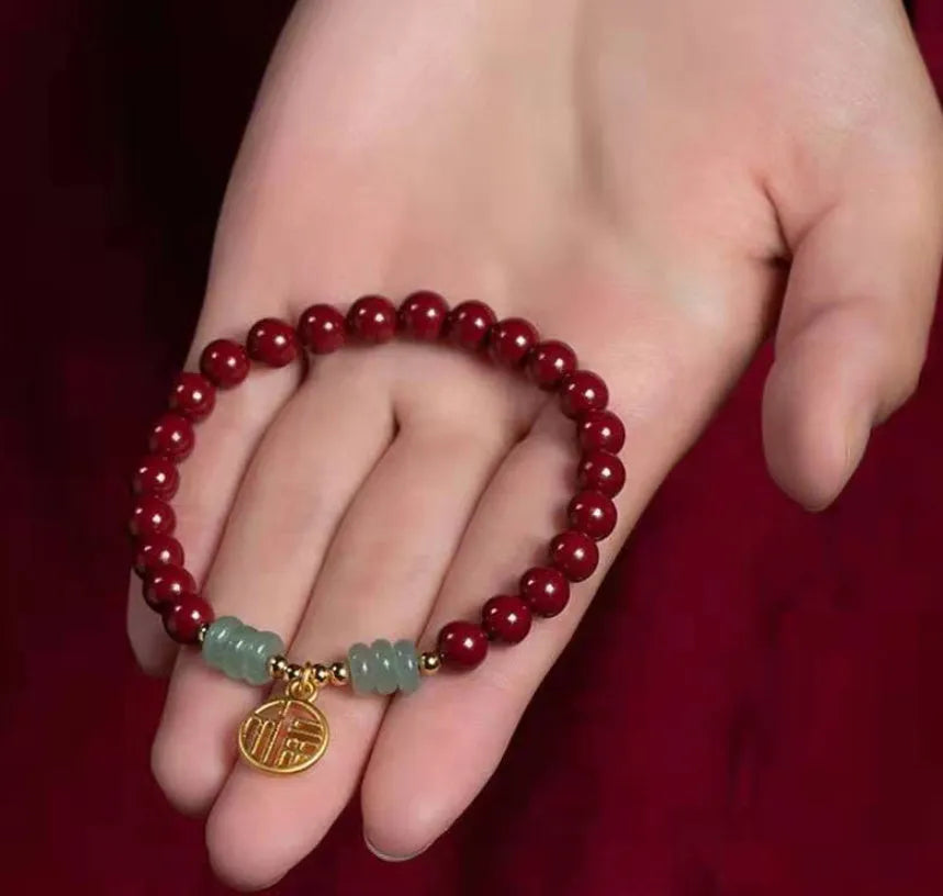 Handmade cinnabar bracelet with copper bead accent in wave shape, unisex design, available in pumpkin or brand cinnabar