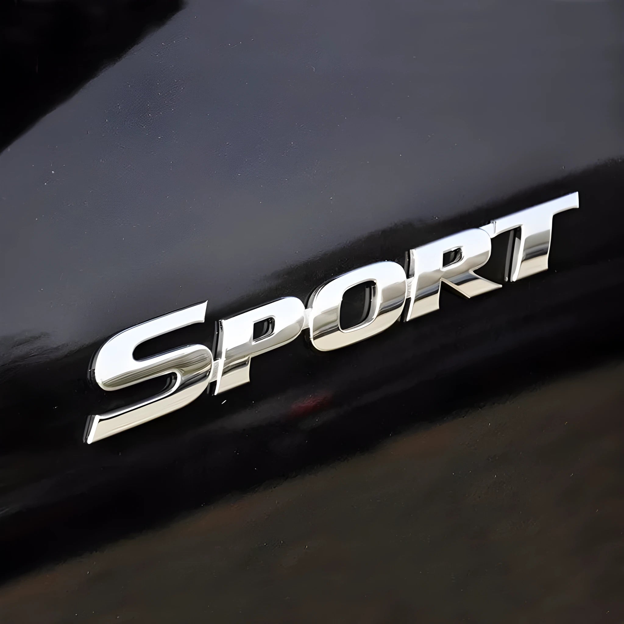 Sport tail sticker in silver electroplated finish, ABS material, 11.3cm length