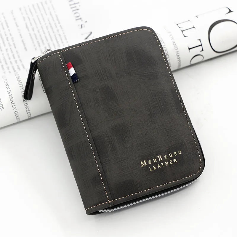 Men's retro short wallet clutch in soft polyurethane leather with letter motif, square vertical shape, available in black and brown colours.