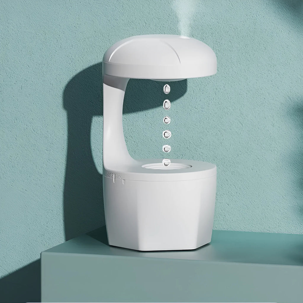 Suspended anti-gravity humidifier in white with USB cable, column shape, and ultrasonic mist output