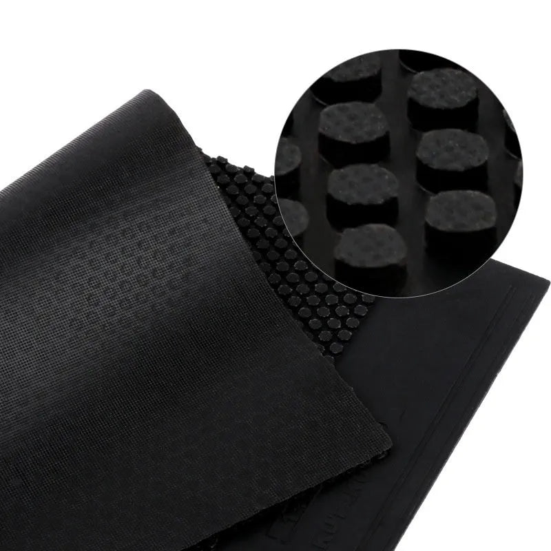 Single sheet of black table tennis rubber with small particle textured surface