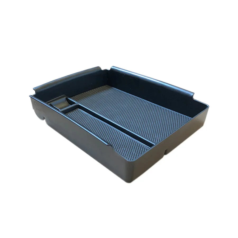 Black ABS wireless charging base stand holding a smartphone on a QI charging pad.