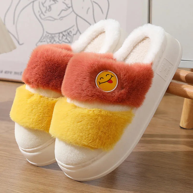 Pink and green cartoon plush winter slippers with cashmere lining and a thickened sole.