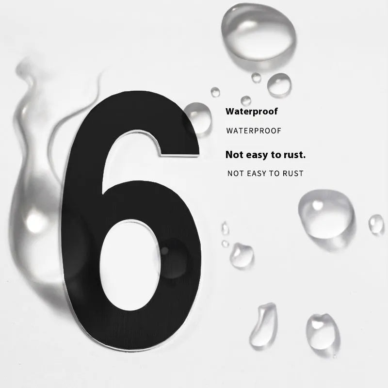 Black stainless steel adhesive house number sticker, 7.5cm tall, with raised digital font.