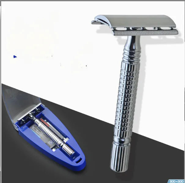 Chrome double edged safety razor with brass handle and closed comb head on storage box.