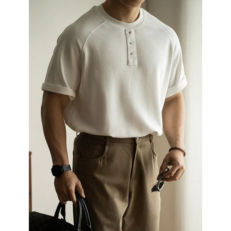 Men's smoky gray casual pullover top with raglan sleeves and a textured fabric.
