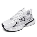 Men's white and gray mesh casual running shoes with a round toe and injection moulded plastic sole.