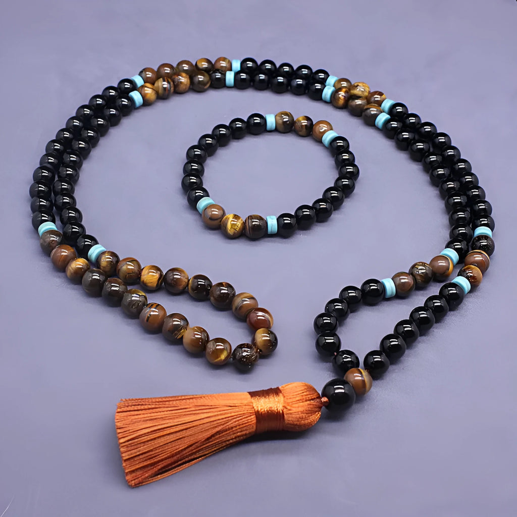 Geometric agate jewellery set with black bracelet and tiger-eye necklace