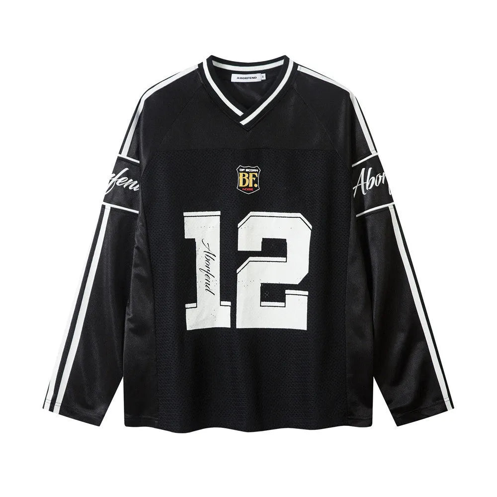 Men's black and white loose fit long sleeve V-neck T-shirt made from polyester jersey fabric.