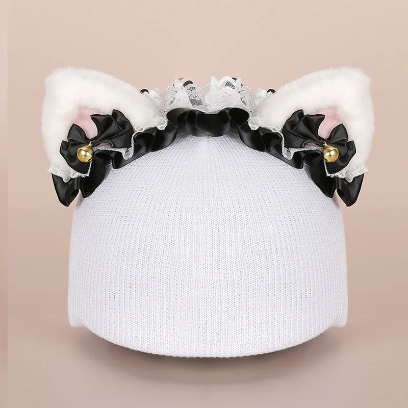 Soft plush cartoon decoration cap placed on a ski helmet for personalisation.