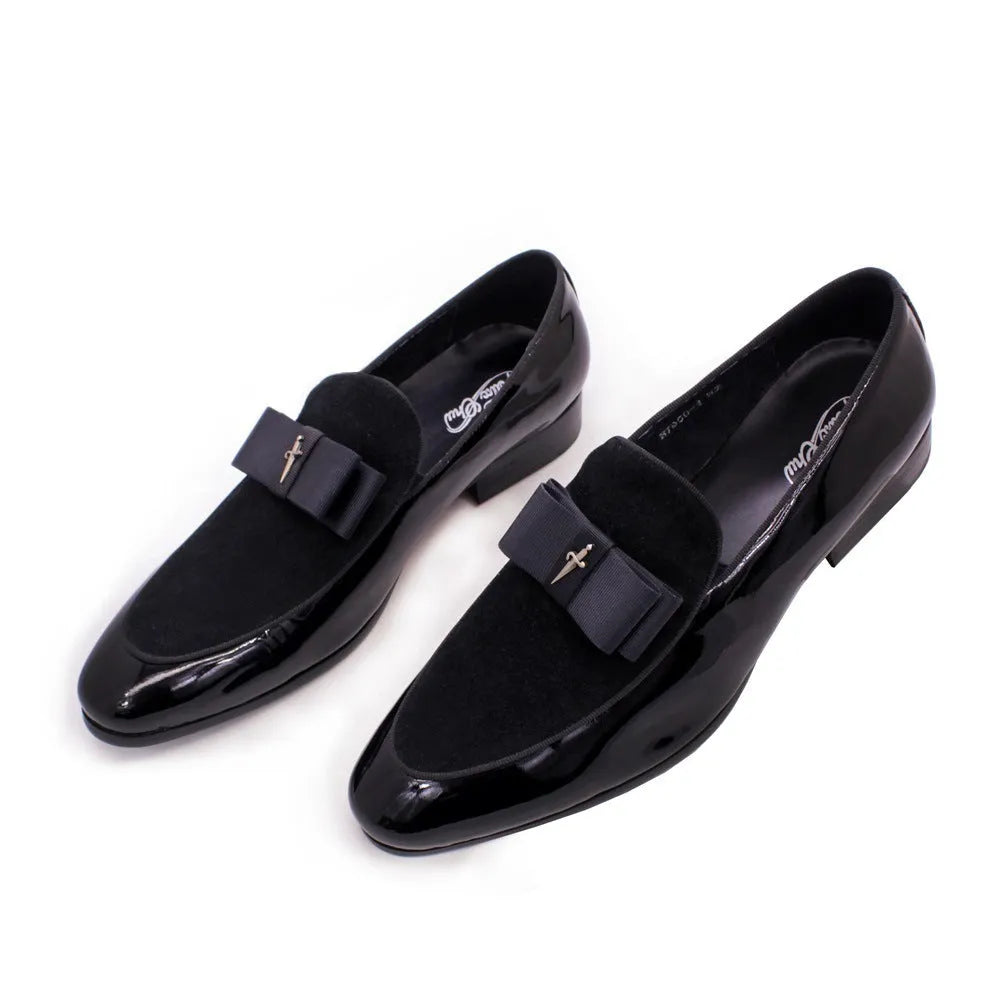 Men's glossy black patent leather low-top shoes with a tassel detail on a rubber sole.