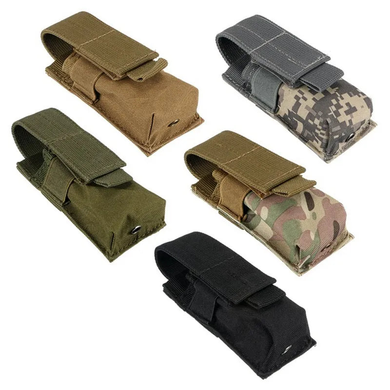 MOLLE-compatible tactical waist bag in black nylon with elastic cord buckle, shown on a belt.