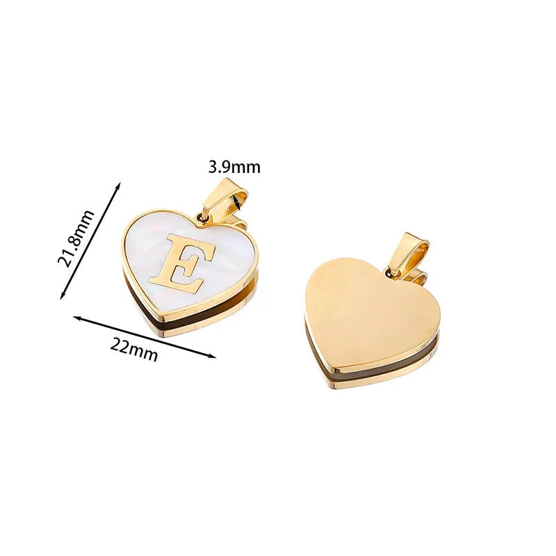 Gold heart necklace with white shell centre on stainless steel chain