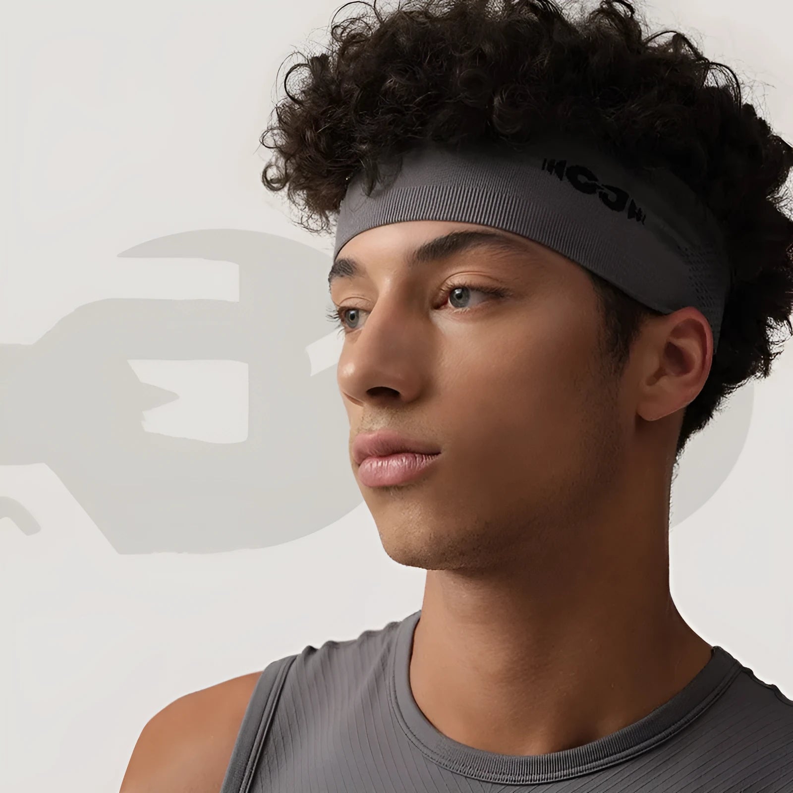 Seamless knitted sports hair band in black, grey and blue colours for running and cycling