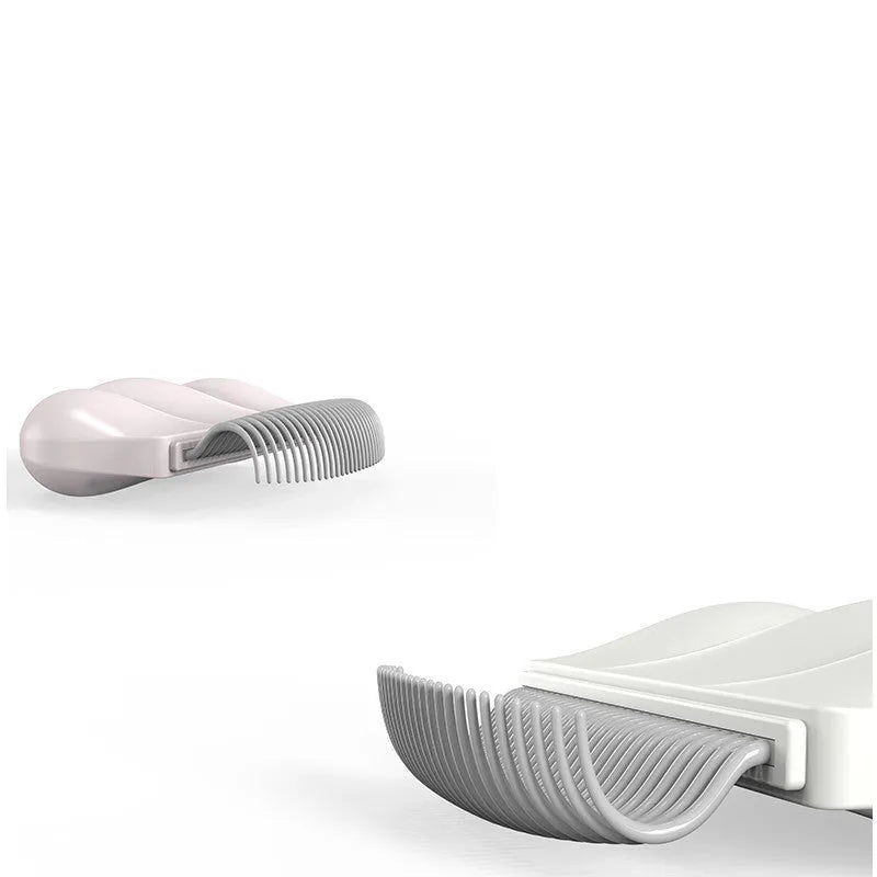 Paw Soft deshedding and matted fur remover brush for cats and dogs in blue, pink or white.