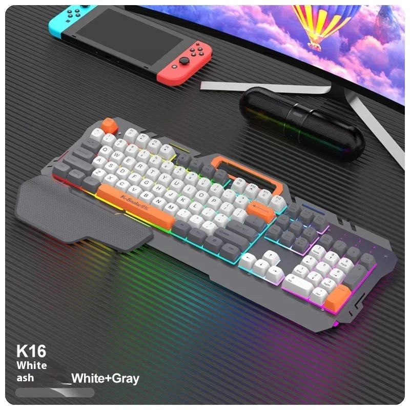 Blue wired gaming keyboard and mouse combo with backlit keys on gaming desk