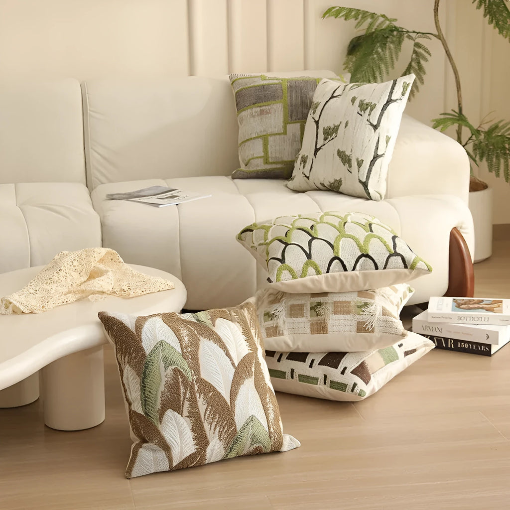 Square Jacquard floral cushion cover in a choice of colours, showing textured plants and flowers pattern.