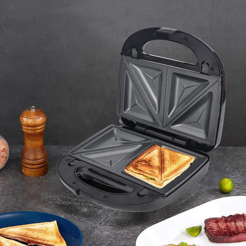 Black double-sided electric sandwich maker with brushed stainless steel lid and non-stick plates