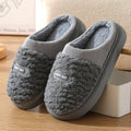 Men's grey and brown plaid pattern slippers with rabbit hair trim and a thick EVA sole.