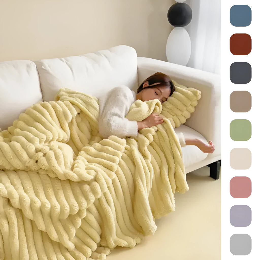 Soft Wind double-sided thickening bubble velvet blanket in a solid colour on a couch.