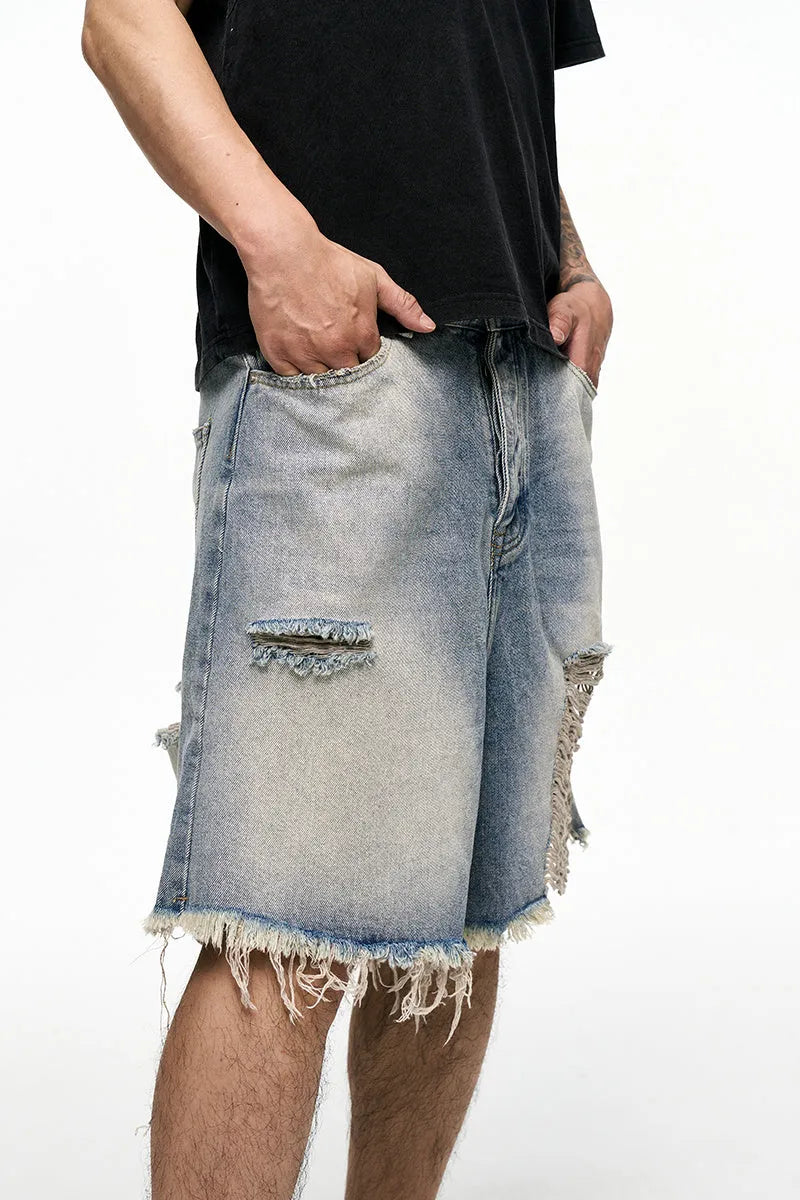 Light blue retro washed men's baggy denim shorts with wide leg cut and fifth pants length