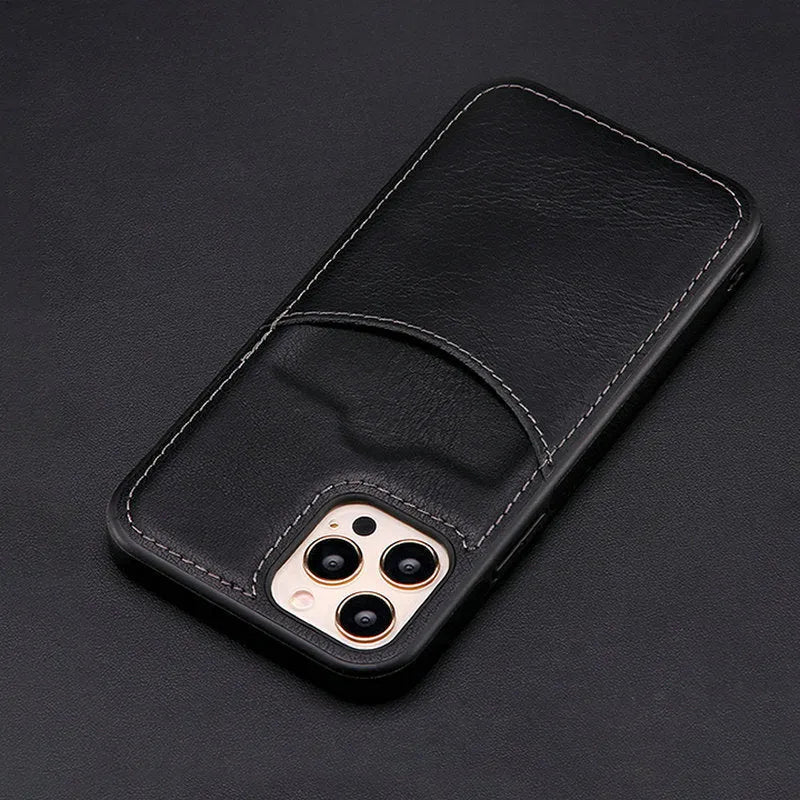 Dark blue PU leather protective case fitted on an iPhone 14 Pro Max smartphone.