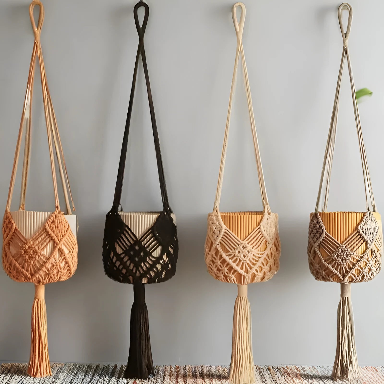 Hand-woven minimalist flower pot in a neutral colour with a woven net pocket extension cord.