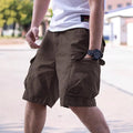 Men's retro-style loose-fit workwear shorts in army green, made from a cotton blend fabric.
