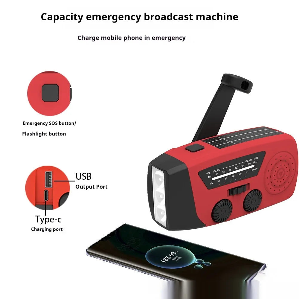 Red rechargeable hand radio torch with built-in speaker and USB interface, compact ABS body, emergency disaster prevention device