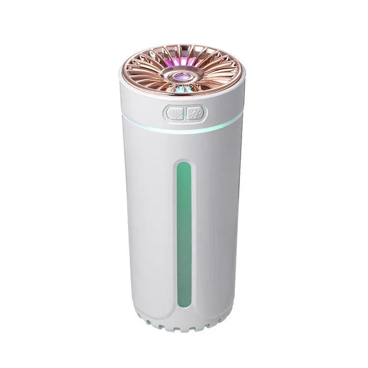 Black wireless ultrasonic humidifier with LED lights sitting in a car cup holder.