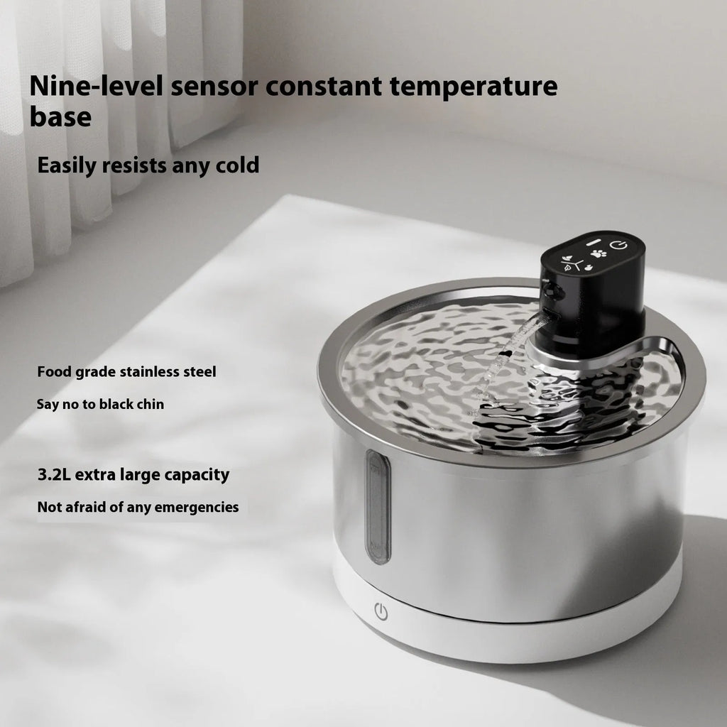 Stainless steel pet water fountain with constant temperature heating base for dogs and cats.