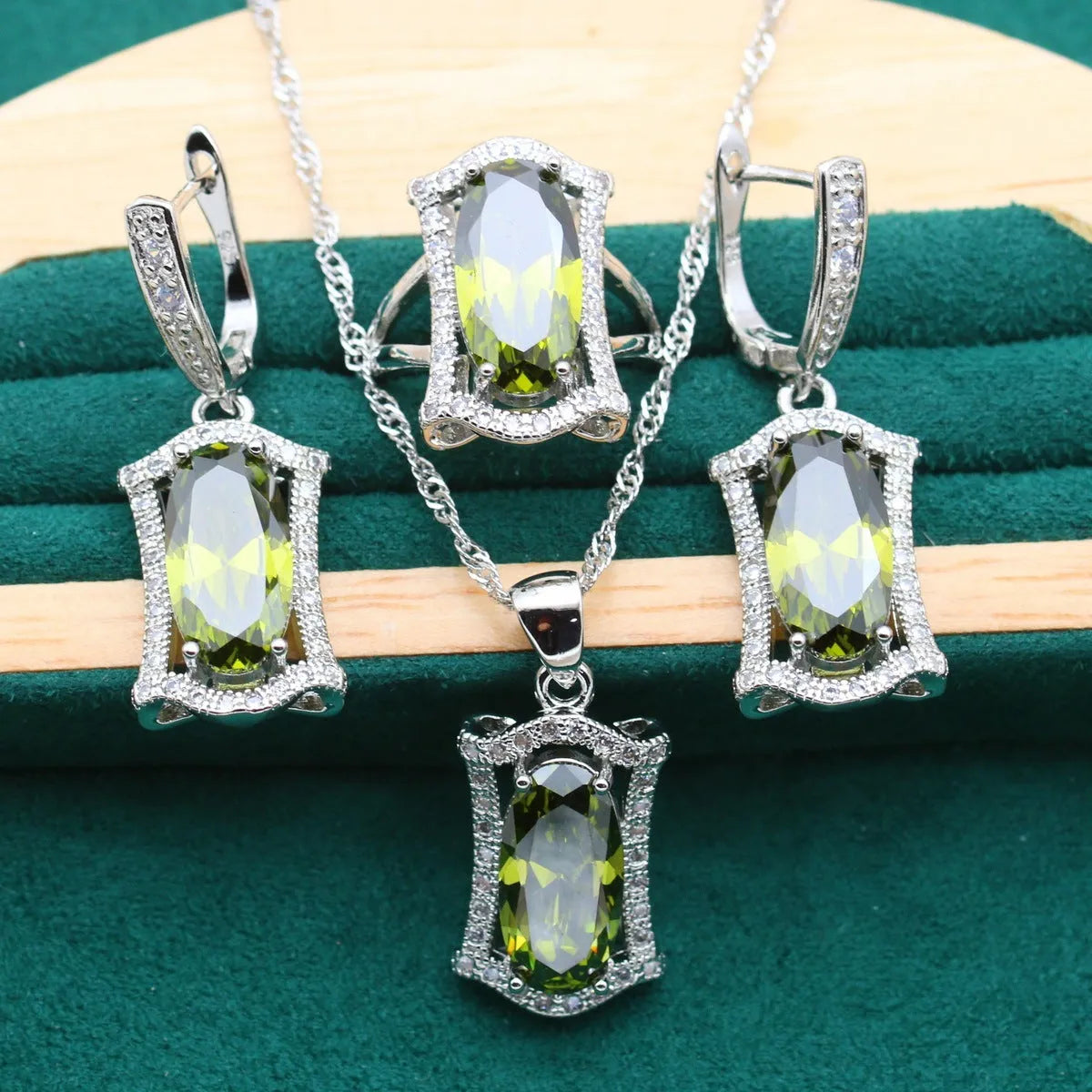 Women's anti-allergy zircon jewellery set with snake bone chain necklace, earrings, ring, and bracelet in yellow gold tone.